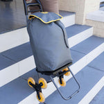 Climb Cart mit grauer Tasche und 6-Rad-System wird auf einer Treppe genutzt.