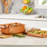 Livington Copperline WonderCooker – zwei kupferfarbene Bratformen mit Gemüse und Fleisch in moderner Küche.