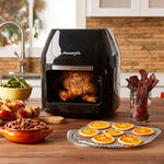 Power AirFryer Multi-Function beim Garen eines Hähnchens – ideal zum Frittieren, Dörren und Braten.