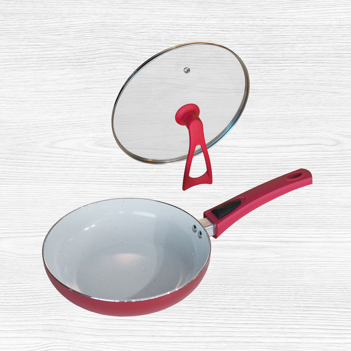 Duo Magic Premium Pfanne mit rotem Griff und Glasdeckel – Antihaftbeschichtung und stabiler Standknauf.