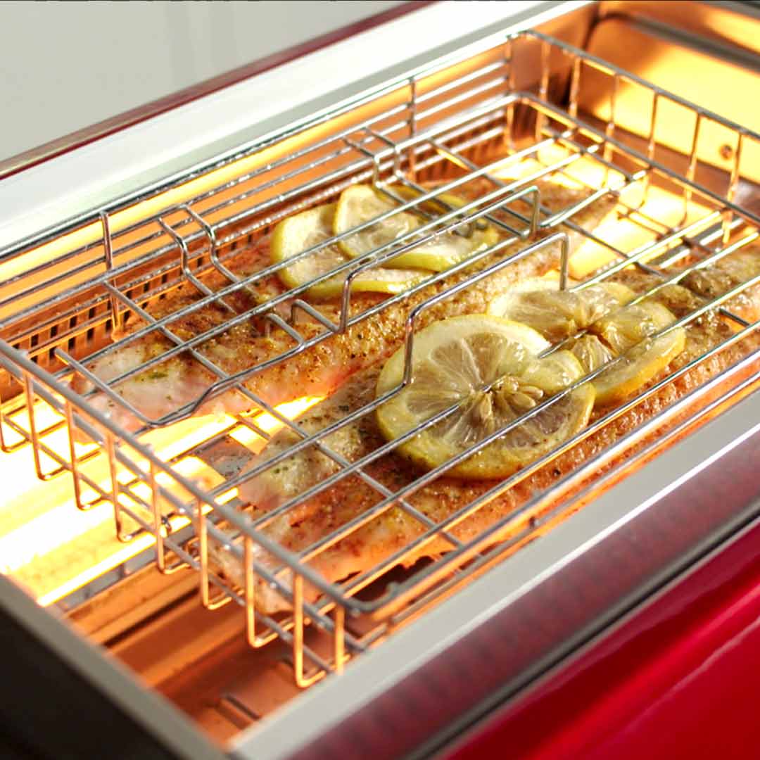 Fischfilets mit Zitrone im Livington Rotisserie Chef – gleichmäßig gegart für aromatischen Genuss.