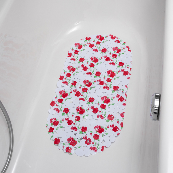 Bunte Badewannenmatte mit rotem Blumenmuster, liegt auf glatter Badewannenoberfläche.