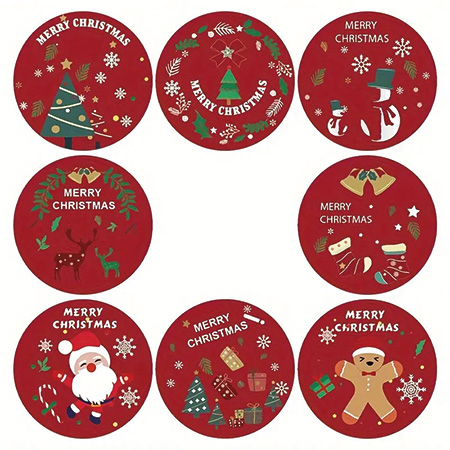 Acht runde rote Aufkleber mit „Merry Christmas“ und weihnachtlichen Motiven wie Baum, Rentier, Schneemann, Geschenken.